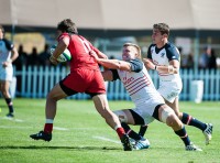 Lou Stanfill making a tackle against Canada in 2014. David Barbal photo.