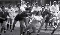 Flores, in the head band chases the ball as England sends the ball out in the 1991 WRWC Final. Photo World Rugby.