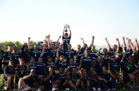 The 2012 USA U20 team raising the Junior World Trophy. P. Crane photo.