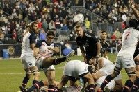 Mike Petri launches a box kick against the Maori All Blacks in 2013. Mike Bobis photo.