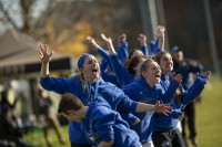 Happy to be here. The UNE sideline erupts. Mark Washburn photo.