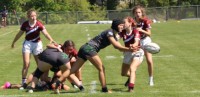 Eagle gets the ball out vs Hamilton. Alex Goff photo.