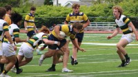 Sam Leopold charges on in the JV game. Alex Goff photo.