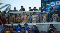 Mostly naked fans. The expression on the face of the guy in the red shirt on the left is priceless.
