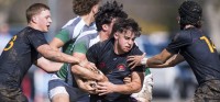 De La Salle (gray and green) vs Jesuit (black). Photo David Barpal photo.