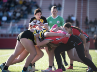 Mya Behrends puts the ball into the scrum.