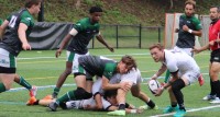 AIC in a 2023 warmup vs Babson. Alex Goff photo.