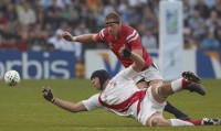 Alex Parker causes havoc against England in the 2007 Rugby World Cup in France. Ian Muir photo.
