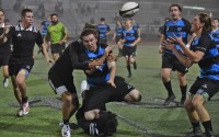 Alta Vista HS in black versus Jaguars in blue. Photo: Rogers Photography. 