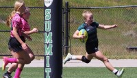 Ashley Misch, Shalanda Baker Award winner, going in for one of her 33 tries.