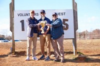 Prather accepts the trophy.