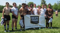 Barbarians celebrate their Junior bracket win. Alex Goff photo.