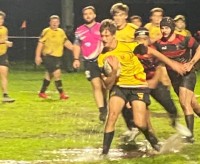 Brother Martin in yellow, Park Hill in black-and-red.