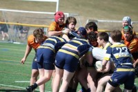 With his shirt pulled over his head, Marty Lenehan kept on playing. Photo Charlotte Tigers.