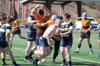 With his shirt pulled over his head, Marty Lenehan kept on playing. Photo Charlotte Tigers.