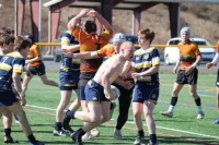 With his shirt pulled over his head, Marty Lenehan kept on playing. Photo Charlotte Tigers.