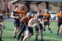 With his shirt pulled over his head, Marty Lenehan kept on playing. Photo Charlotte Tigers.