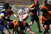 With his shirt pulled over his head, Marty Lenehan kept on playing. Photo Charlotte Tigers.