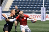 2011 CRC. Central Washington's Tim Stanfill gets some attention. Ed Hagerty photo.