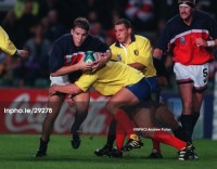 Dan Lyle takes on a Romanian defender ... or two. Photo INPHO/James Paton.