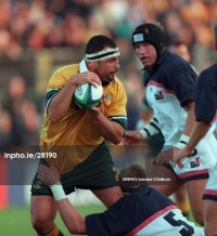 Dave Hodges keeps an eye on Michael Foley in the 1999 Rugby World Cup. Photo INPHO / Lorraine O'Sullivan.