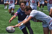 DC Academy in white, New England Academy in blue. David Hughes photo.