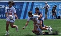 DC Academy in white, New England Academy in blue. David Hughes photo.