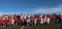 In Tier 2 North HS beat East HS. Both teams pose after the game.