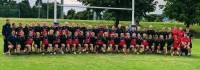 EIRA and Ulster U18 girls pose together.