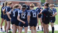 HUddle time at halftime. Alex Goff photo.