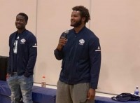 Iowa Central player Elijah Hayes speaking to kids at a local middle school.