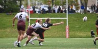 Fairfield flyhalf sends out a pass as he is hit. Photo @CoolRugbyPhotos.