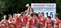 Fairfield raises the Jeffery P. von Arx, SJ Cup. Photo @coolrugbyphotos.