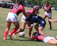 Jordan Duncan presents th ball with Liberty Benitez and Solana Shimura in support vs Tsunami Canada Misfits.