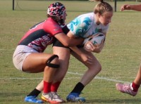 Liberty Benitez makes a tackle against Atlantis.