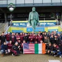 The Fordham players at Croke Park with the statue of Gaelic Athletic Association founder Michael Cusack. Irish Rugby Tours.