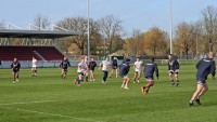 Players play touch during Monday's captain's run.