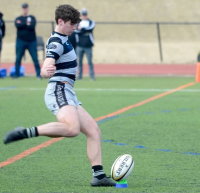 George Vezina kicks for goal. Photo Dianna Toy.