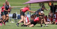 DSHA flanker Mary Foy flies in for the tackle. Alex Goff photo.