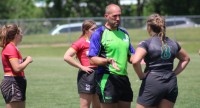 Eagle captain Jordynn LeBeau has a meeting with referee Jeff Noe. Alex Goff photo.