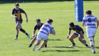 Gonzaga charges on vs St. Ignatius. Alex Goff photo.