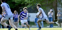 Georgetown Prep in white vs Gonzaga in purple and white hoops. Photo @CoolRugbyPhotos.