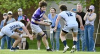 Georgetown Prep in white vs Gonzaga in purple and white hoops. Photo @CoolRugbyPhotos.