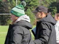 Seeing the grass from the other side. Bizer, in bobble hat, was assistant coach with Dartmouth in 2021.