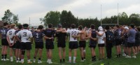 Herriman and Gonzaga huddle up together. Alex Goff photo.