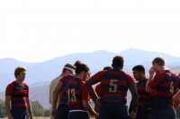 Huddling up at the 2017 NAI 7s. Alex Goff photo.