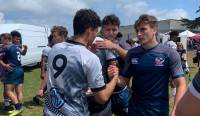 Players shake hands post-match after the quarterfinals.