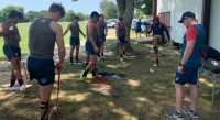 HS All Americans warming up at World School 7s.