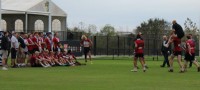 IUP players carry RJ Beach to their team photo. Alex Goff photo.