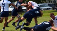 James Hughes makes a tackle for UMW. David Hughes photo.